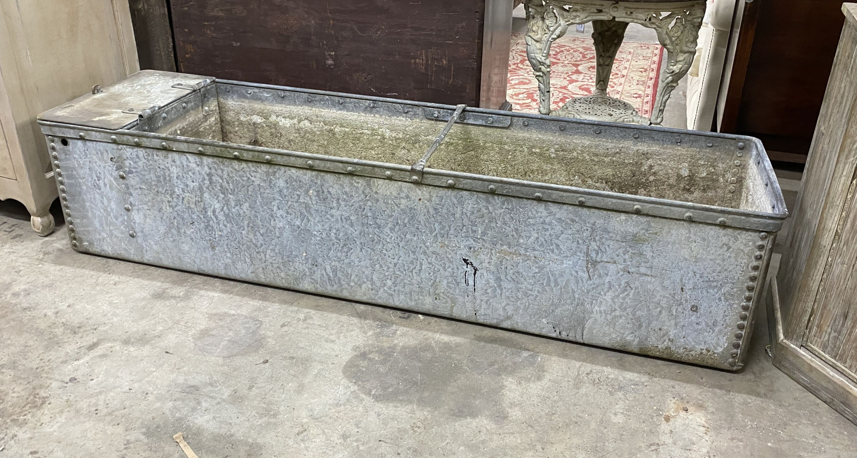 A large vintage galvanised water trough, length 187cm, depth 48cm, height 43cm